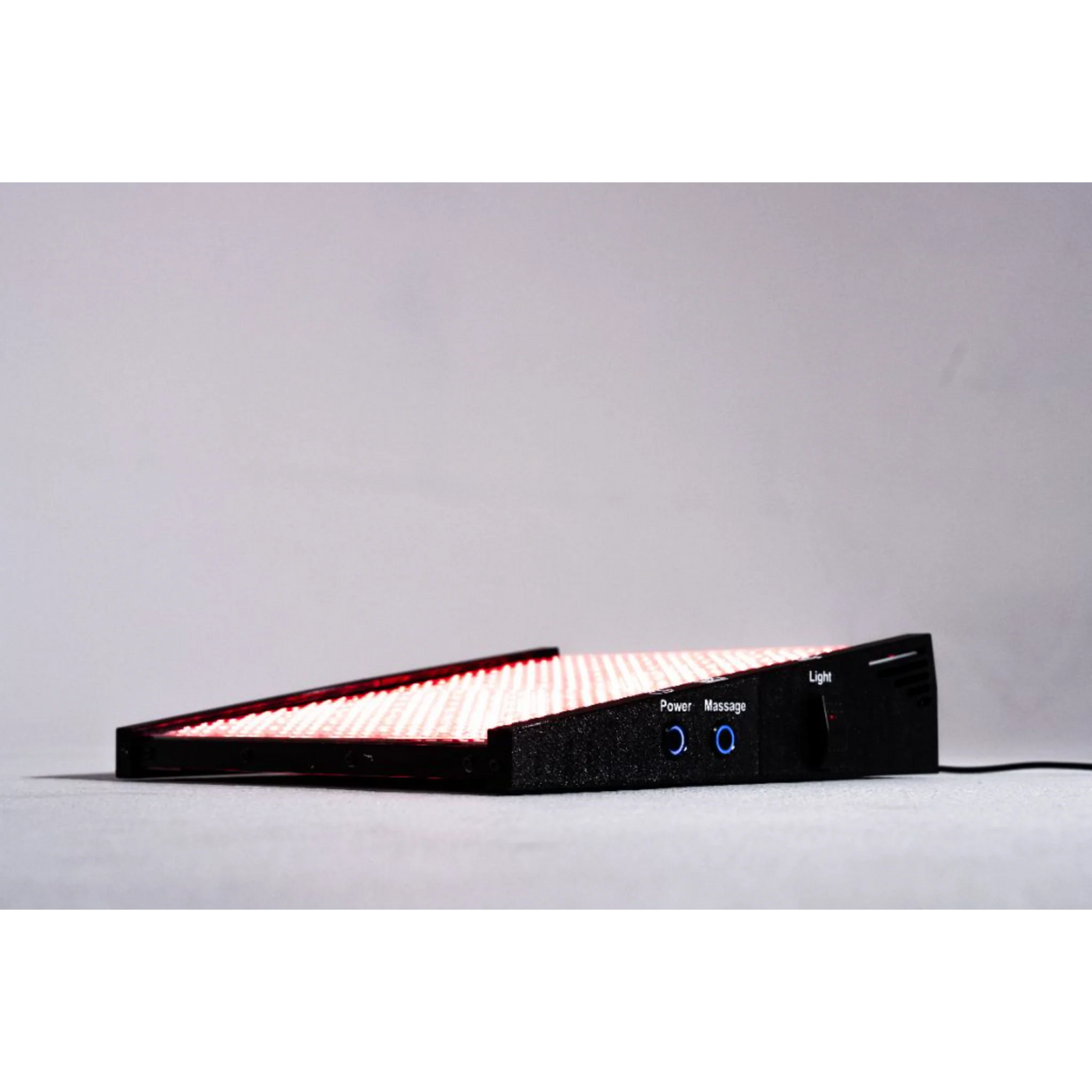 Body Balance System Foot Revitalizer Red & Infrared Light Device – panel side view glowing red