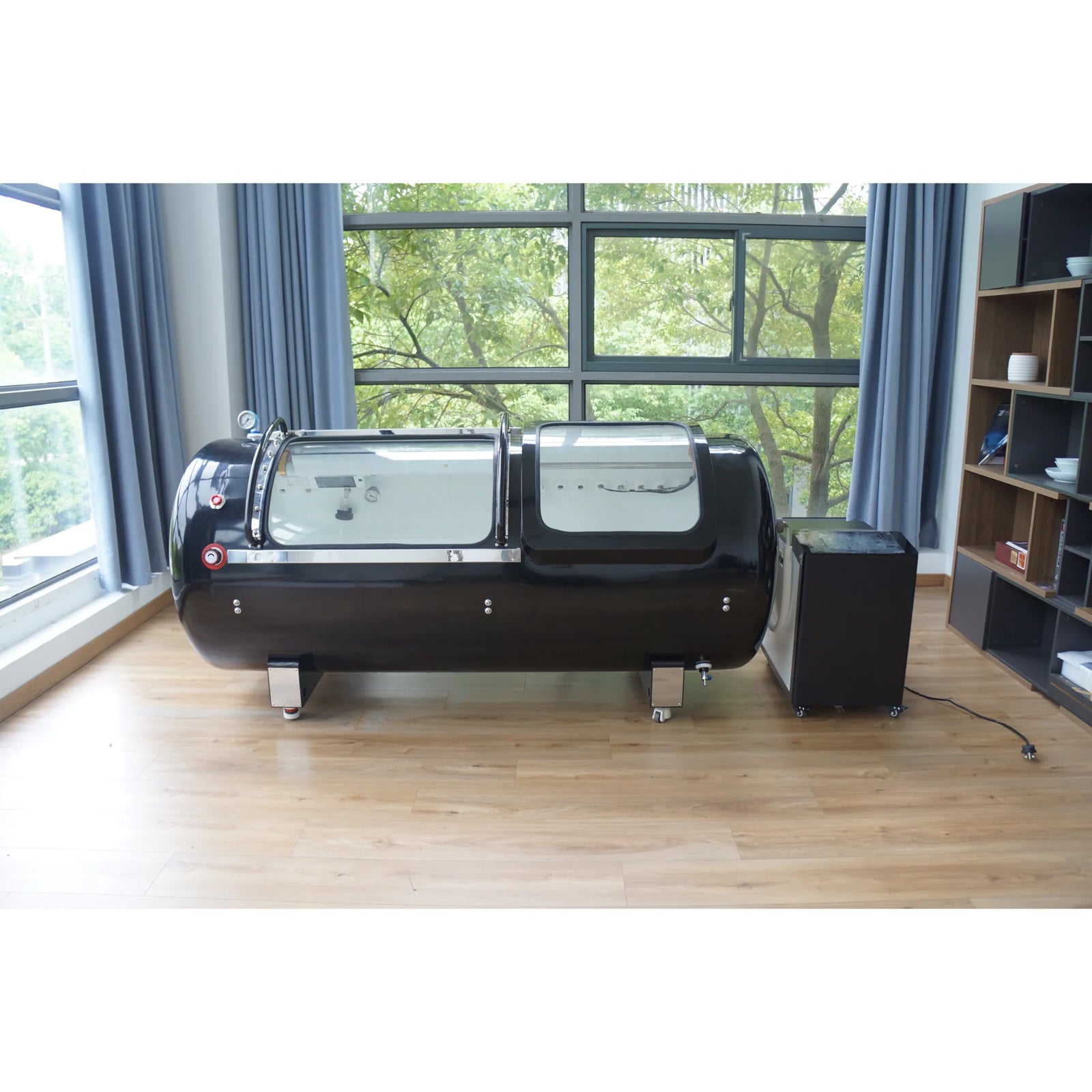 Macy-Pan HP2202-90 Diamond Hard-Shell Hyperbaric Chamber – black chamber beside a cabinet in a room