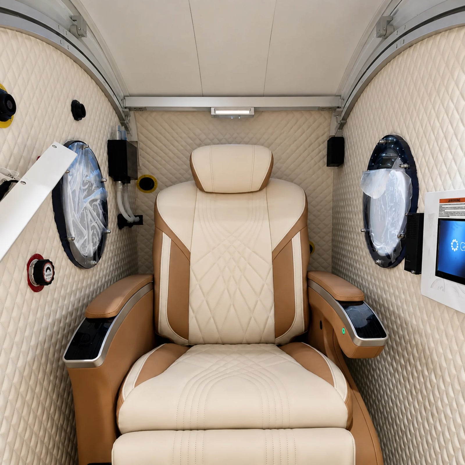 Macy-Pan HP750 Hard-Shell Sitting Hyperbaric Chamber – interior with a cream leather recliner
