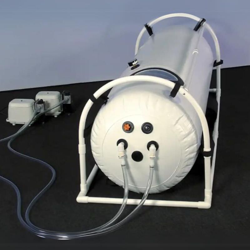 Summit to Sea Shallow Dive 26" Hyperbaric Chamber – rear view showing air hoses and pump