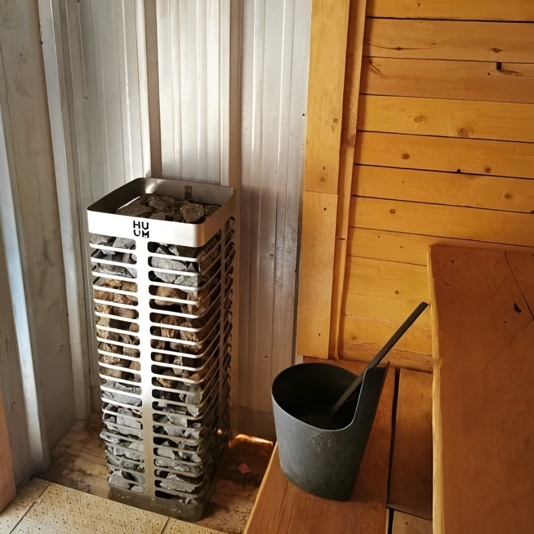 HUUM 11 Steel 10.5kW electric sauna heater, installed