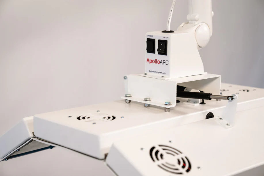 Close-up of ApolloARC control switches and brand label on therapy device