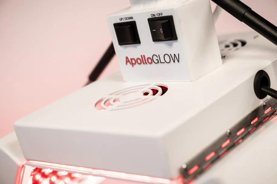 Close-up of ApolloGLOW red light therapy panel showing control switches and fan vent