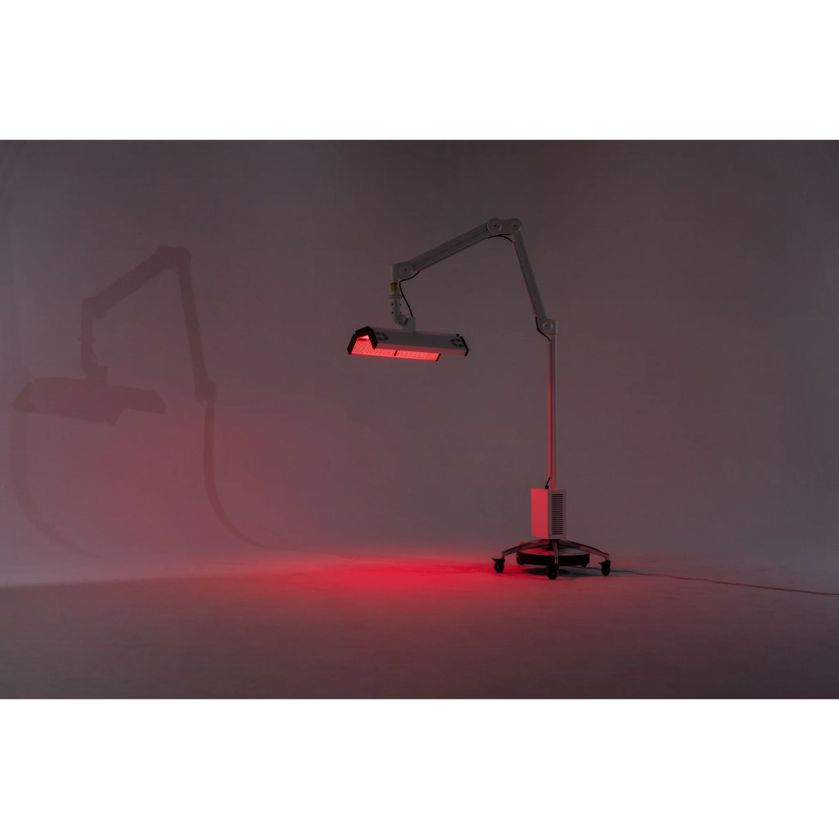 Body Balance System ApolloARC Red & Infrared Light Panel – stand and panel glowing red in a studio