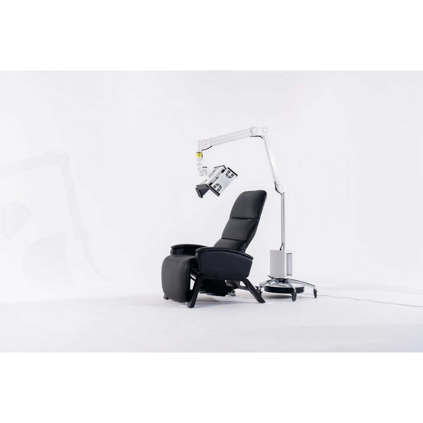 Body Balance System ApolloGLOW Red & Infrared Light Panel – panel on the stand beside a black recliner
