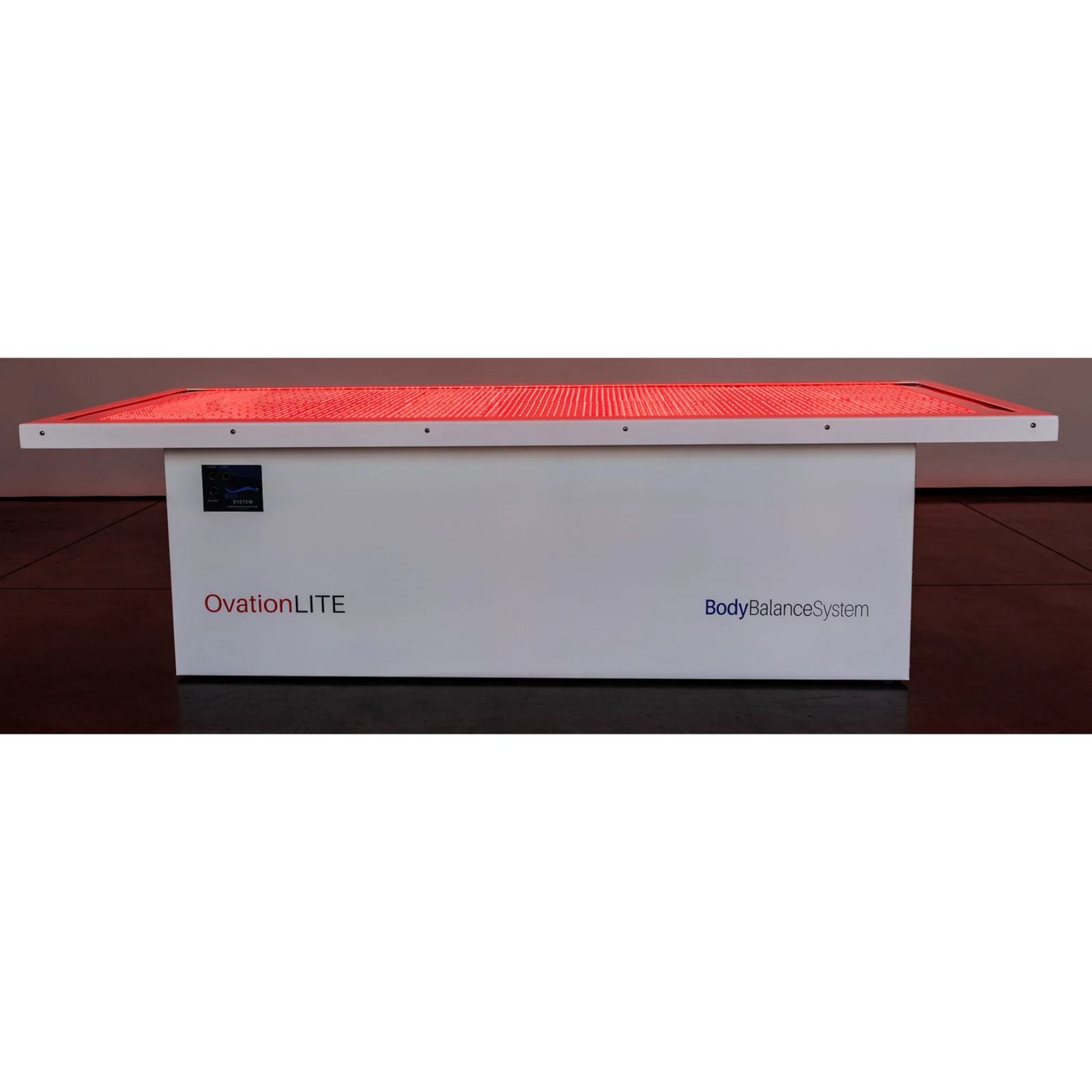Body Balance System OvationLITE Zero Gravity Red & Infrared Light Bed – bed glowing red on a dark floor