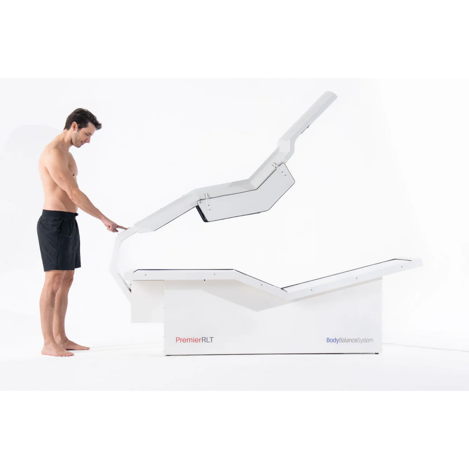 Body Balance System PremierRLT Zero Gravity Red & Infrared Light Bed – man adjusting the light canopy