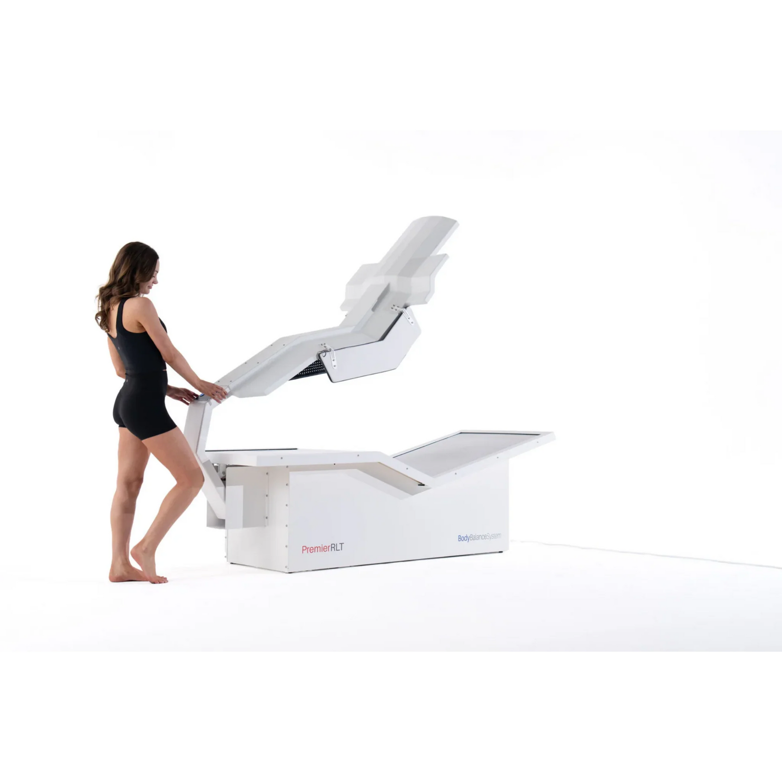 Body Balance System PremierRLT Zero Gravity Red & Infrared Light Bed – woman adjusting the light canopy