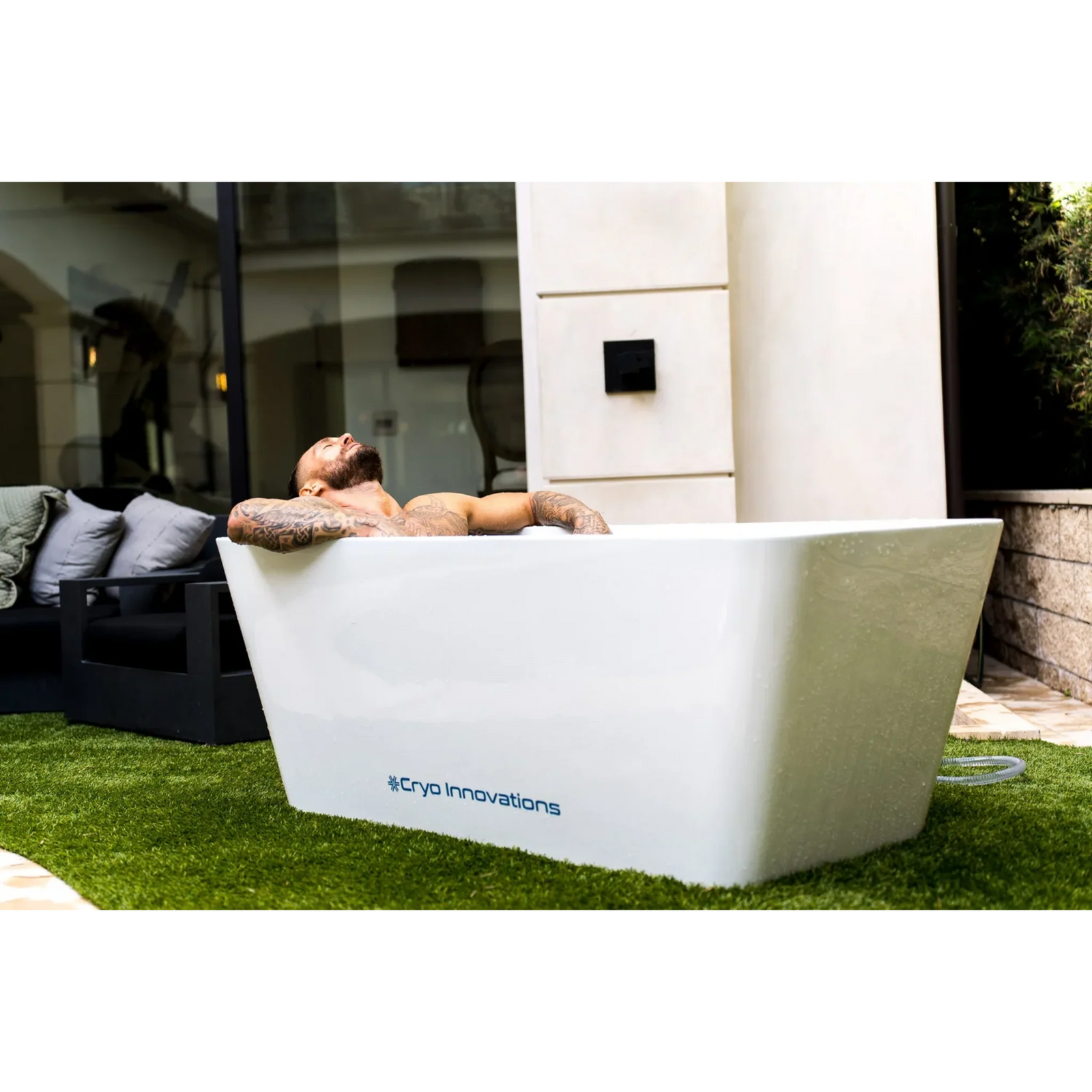 Cryo Innovations XR Cryo Plunge – man relaxing in the tub outdoors