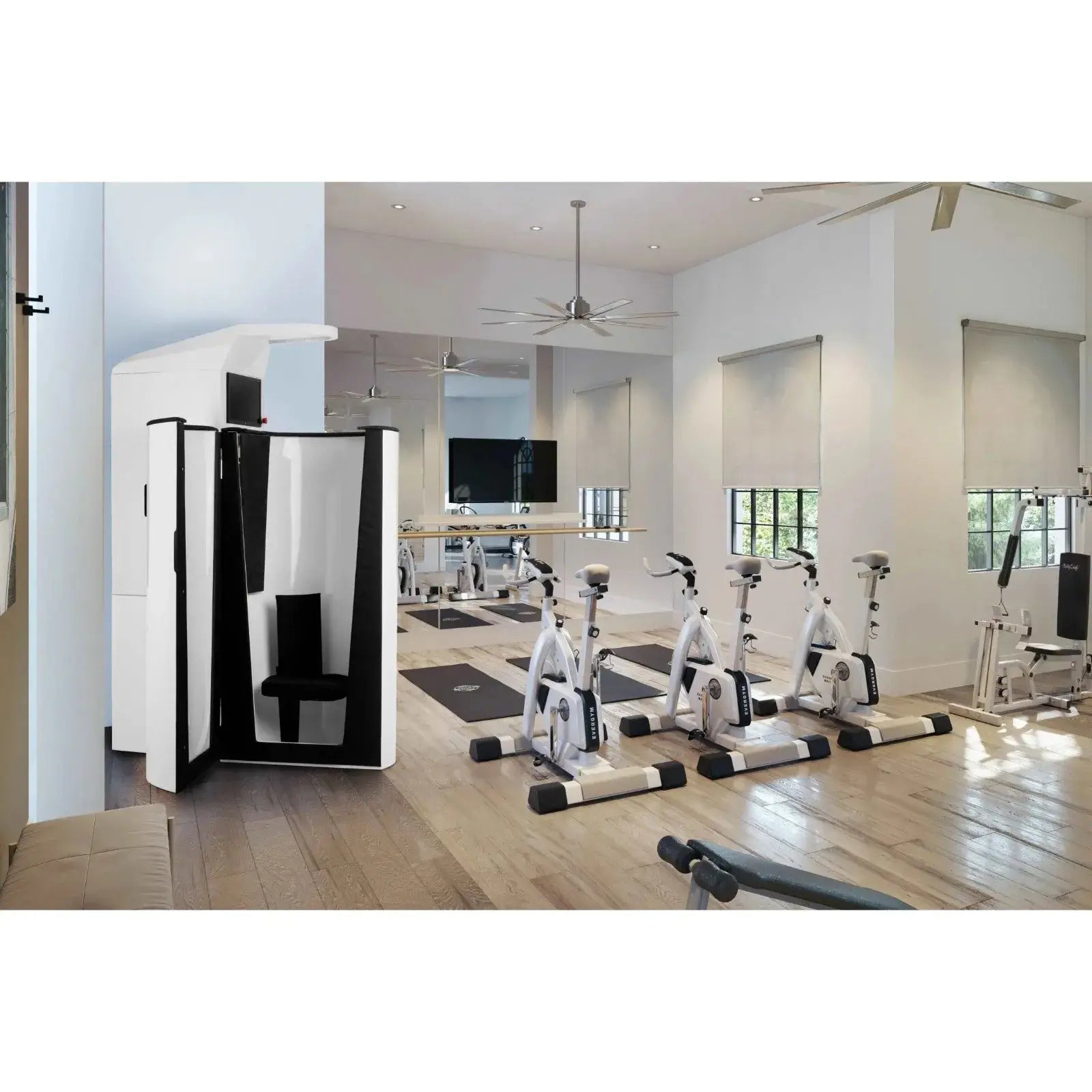 Cryomed Pro Ultra Whole-Body Cryotherapy Chamber – chamber in a gym with exercise bikes