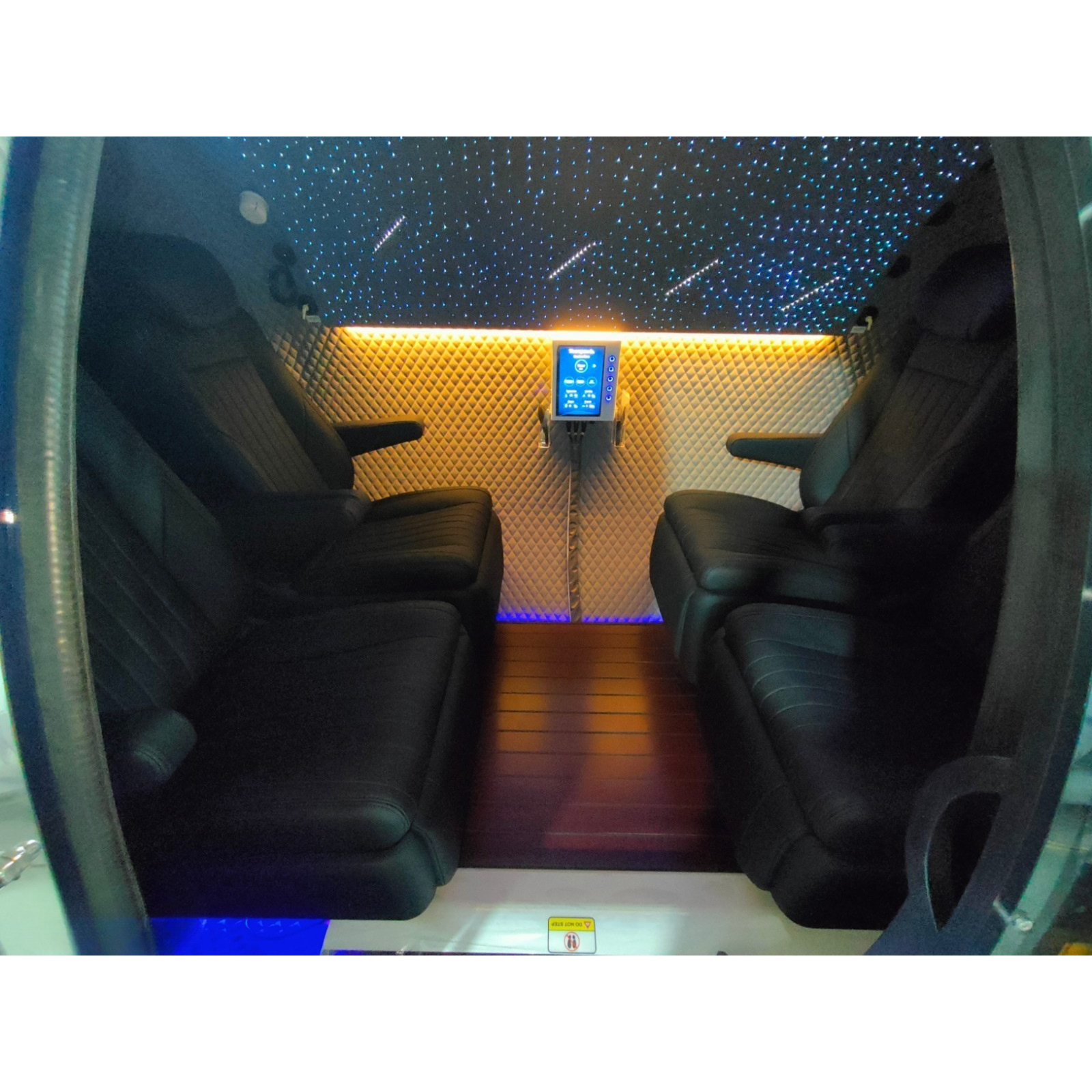 Macy-Pan HE5000 Plus Multiplace Hard-Shell Hyperbaric Chamber – interior with seats and warm lighting