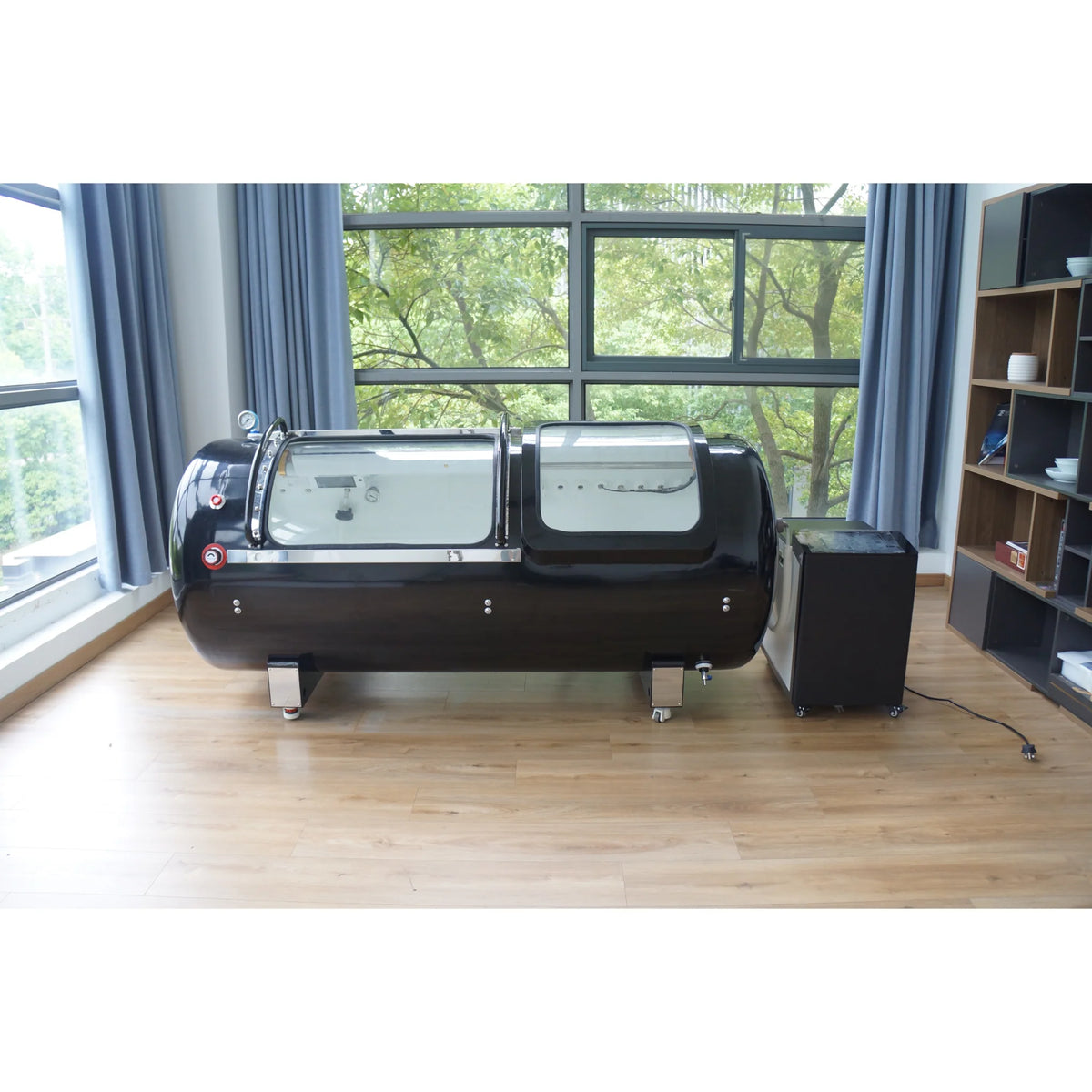 Macy-Pan HP2202-90 Diamond Hard-Shell Hyperbaric Chamber – black chamber beside a cabinet in a room
