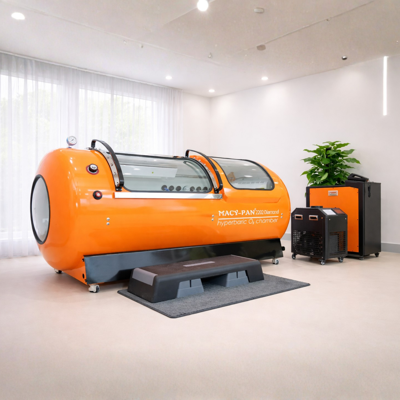 Macy-Pan HP2202-90 Diamond Hard-Shell Hyperbaric Chamber – orange chamber with a plant beside it