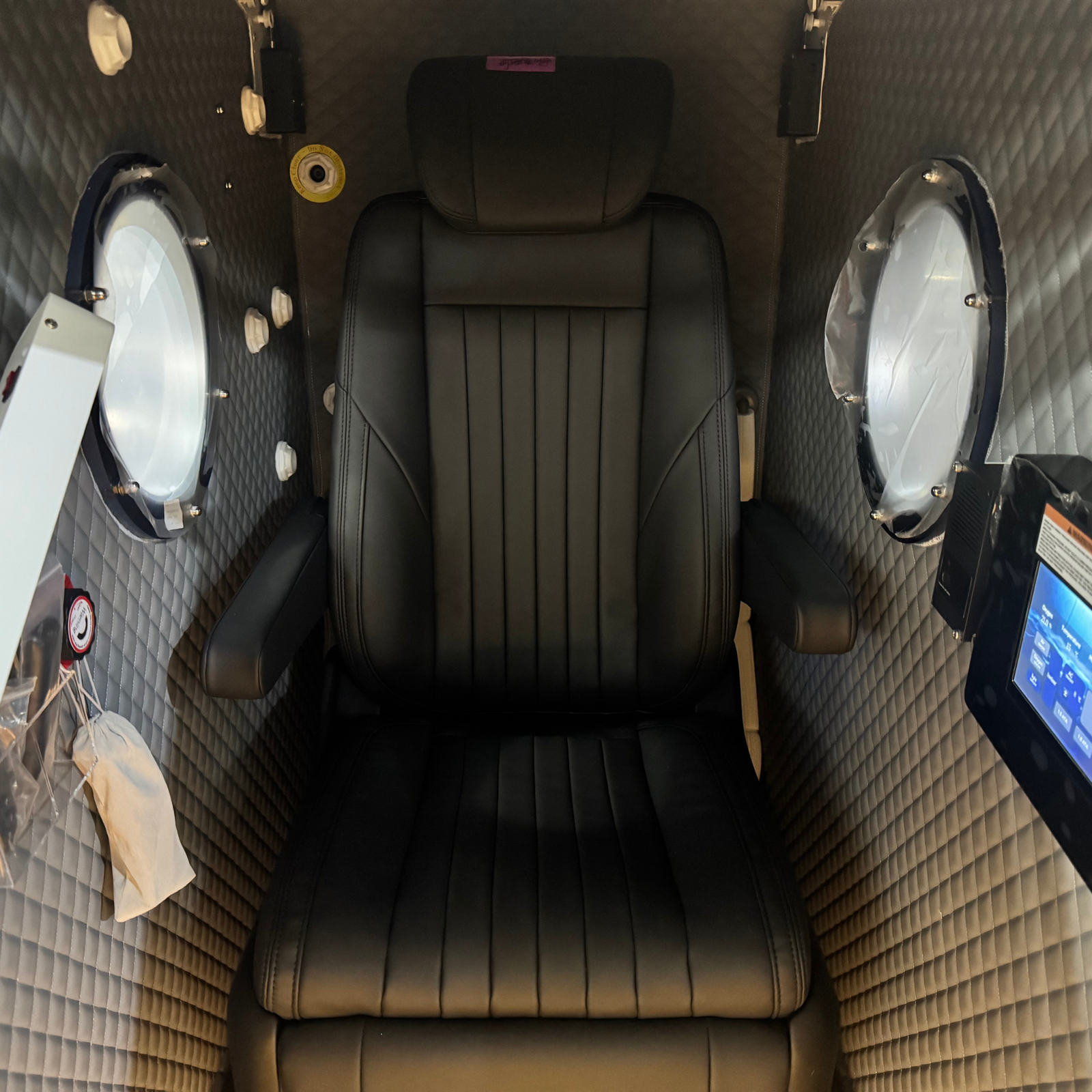 Macy-Pan HP750 Hard-Shell Sitting Hyperbaric Chamber – interior with a black leather seat