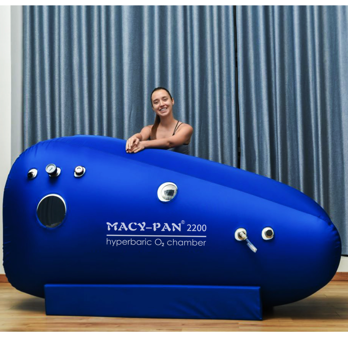 Macy-Pan ST2200 Sitting Hyperbaric Chamber – woman leaning on the chamber