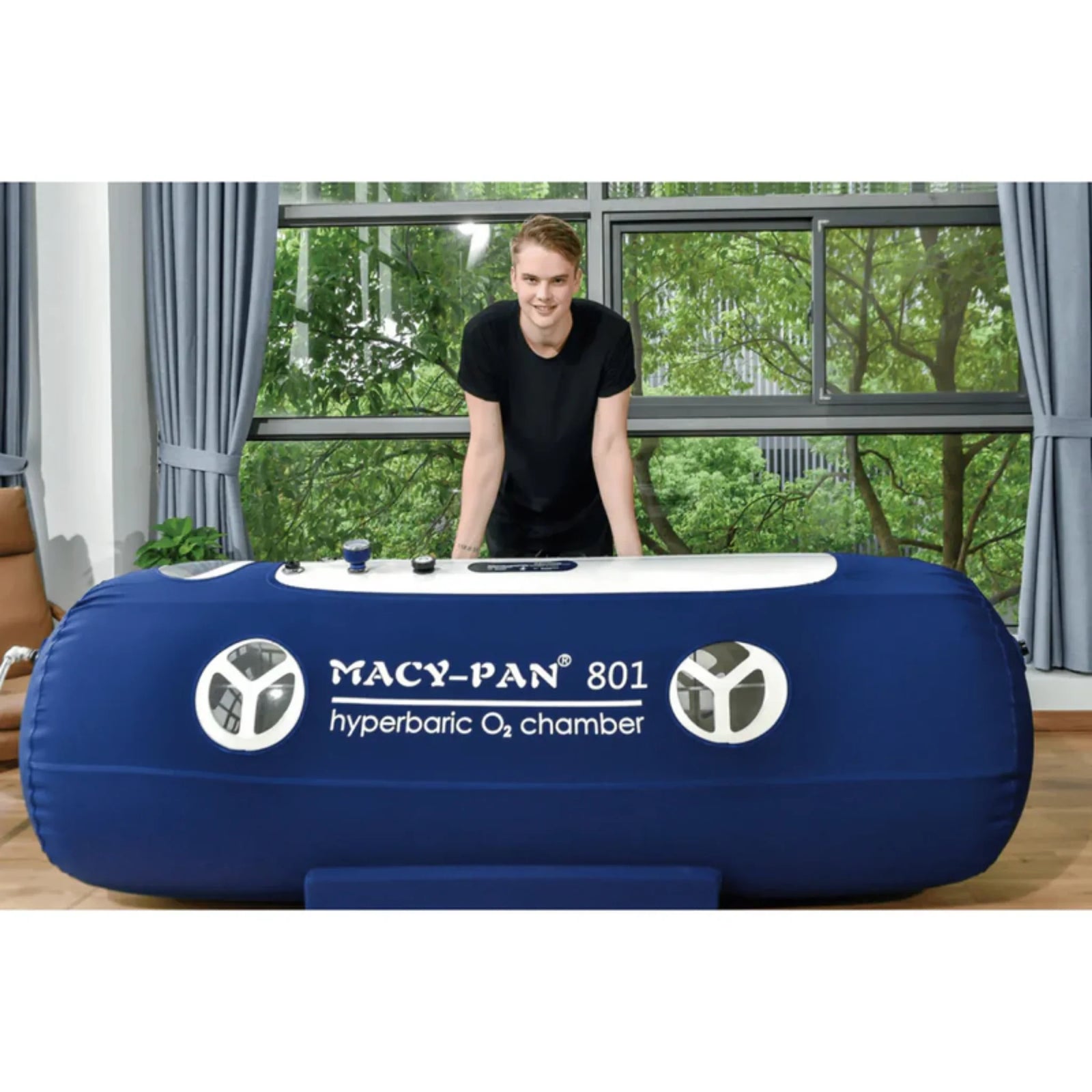 Macy-Pan ST801 Soft Lying Hyperbaric Chamber – man leaning on the chamber