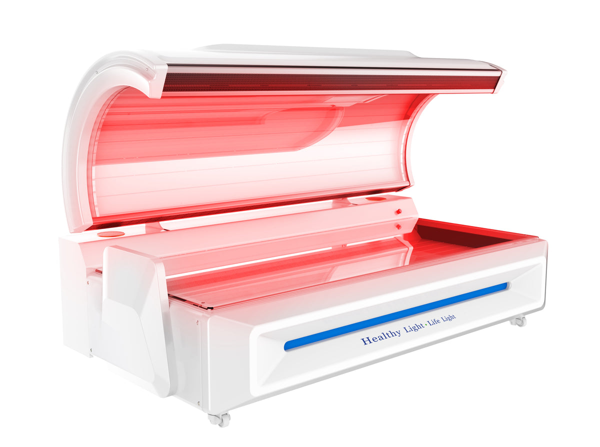 Merican M5N Plus whole-body red light therapy bed in Lunar White, canopy raised with red light on, front three-quarter view