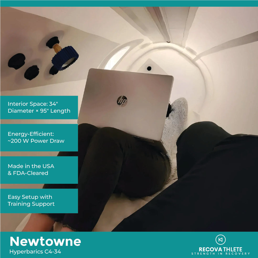 Newtowne Hyperbarics C4-34 Home Hyperbaric Chamber – person working on a laptop inside the chamber