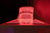 Interior view of OvationULT red light therapy bed with LEDs fully illuminated.