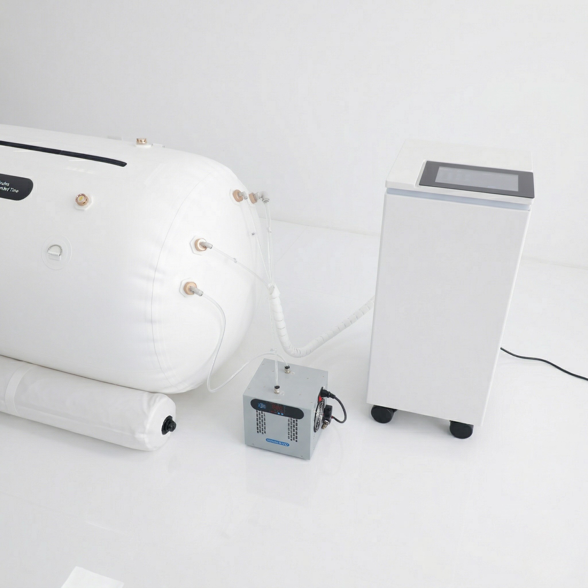 Oxyair OLV-RT01 Soft Lying Hyperbaric Chamber – close-up of the chamber and air compressor