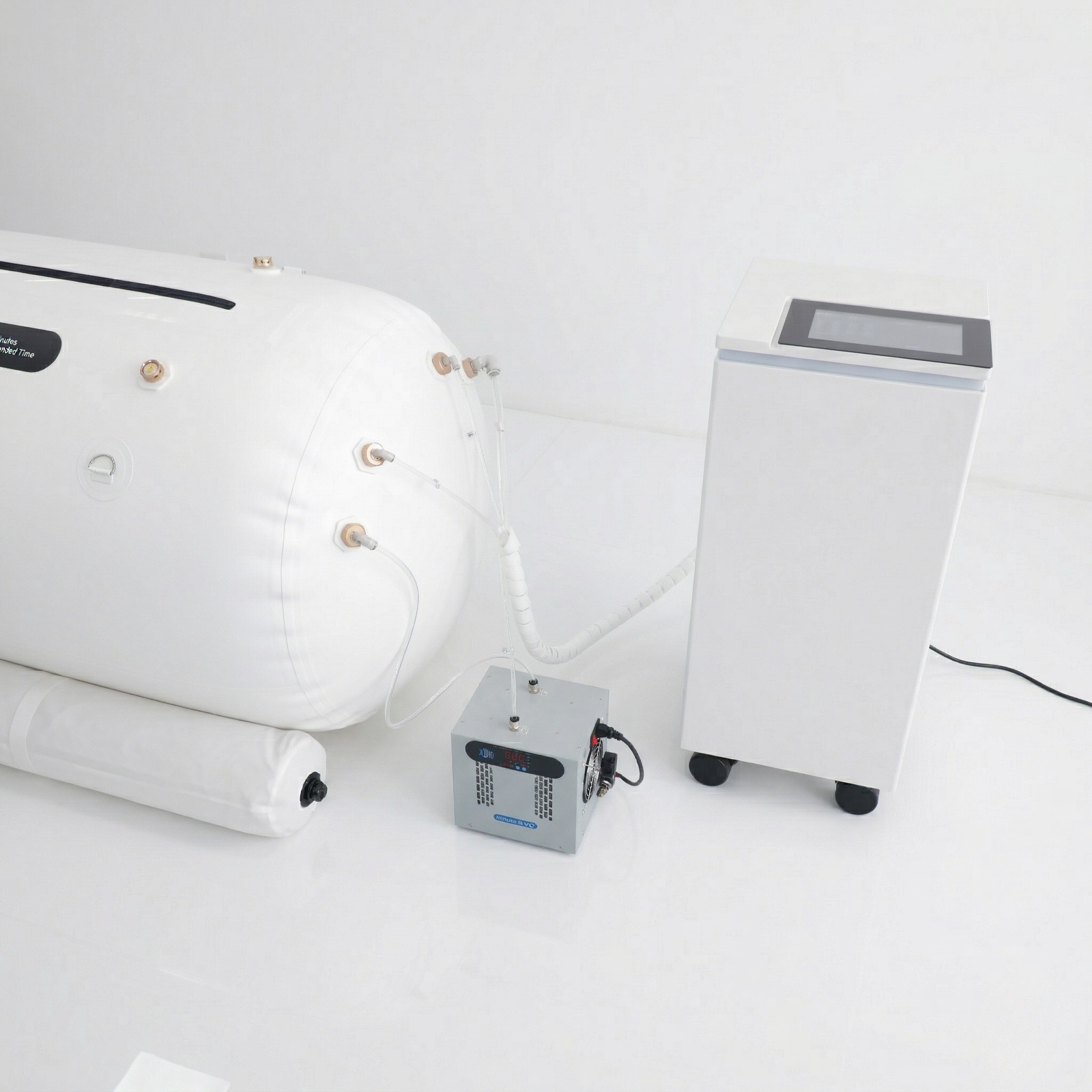 Oxyair OLV-RT01 Soft Lying Hyperbaric Chamber – close-up of the chamber and air compressor