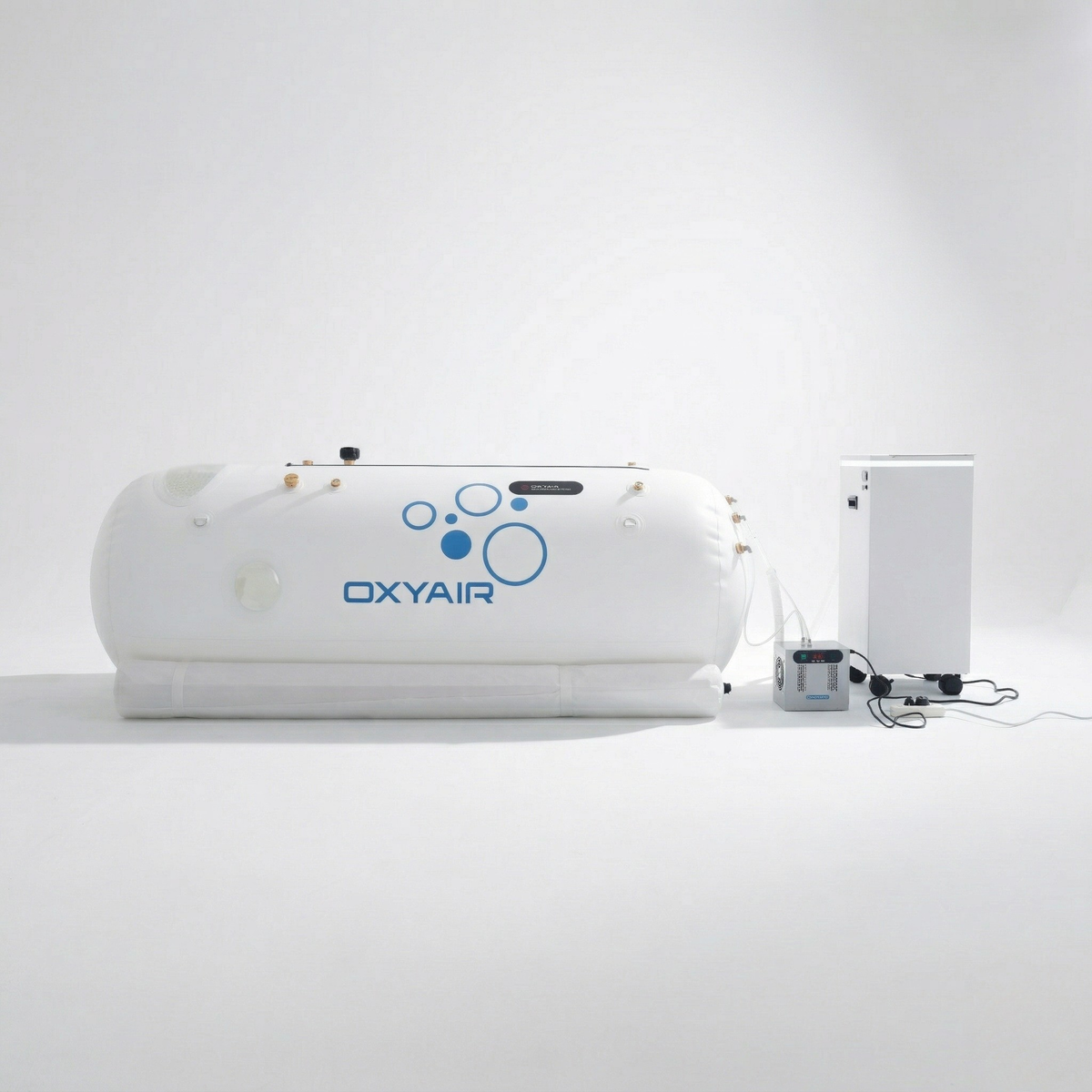 Oxyair OLV-RT01 Soft Lying Hyperbaric Chamber – white soft lying chamber beside its machine