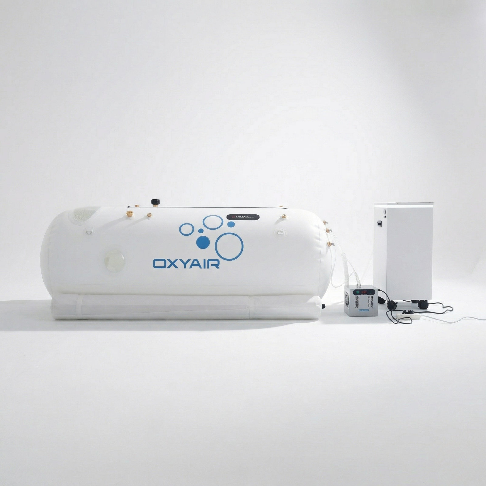 Oxyair OLV-RT01 Soft Lying Hyperbaric Chamber – white soft lying chamber beside its machine
