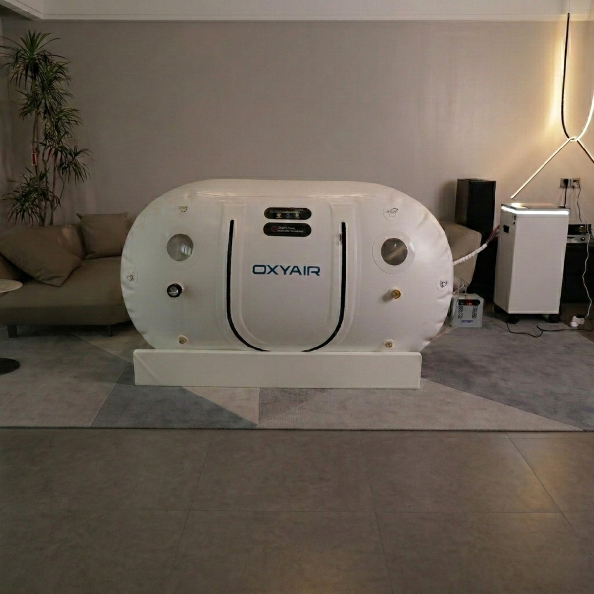 Oxyair OLV-RZT01 Soft Hyperbaric Chamber – chamber beside a sofa