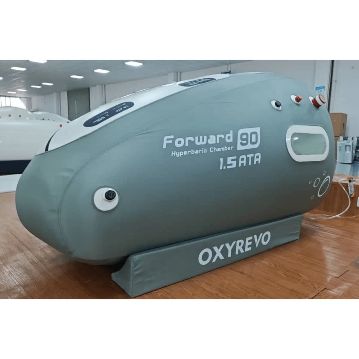 OxyRevo Forward90 Portable Sitting Hyperbaric Chamber – chamber in a showroom from the side