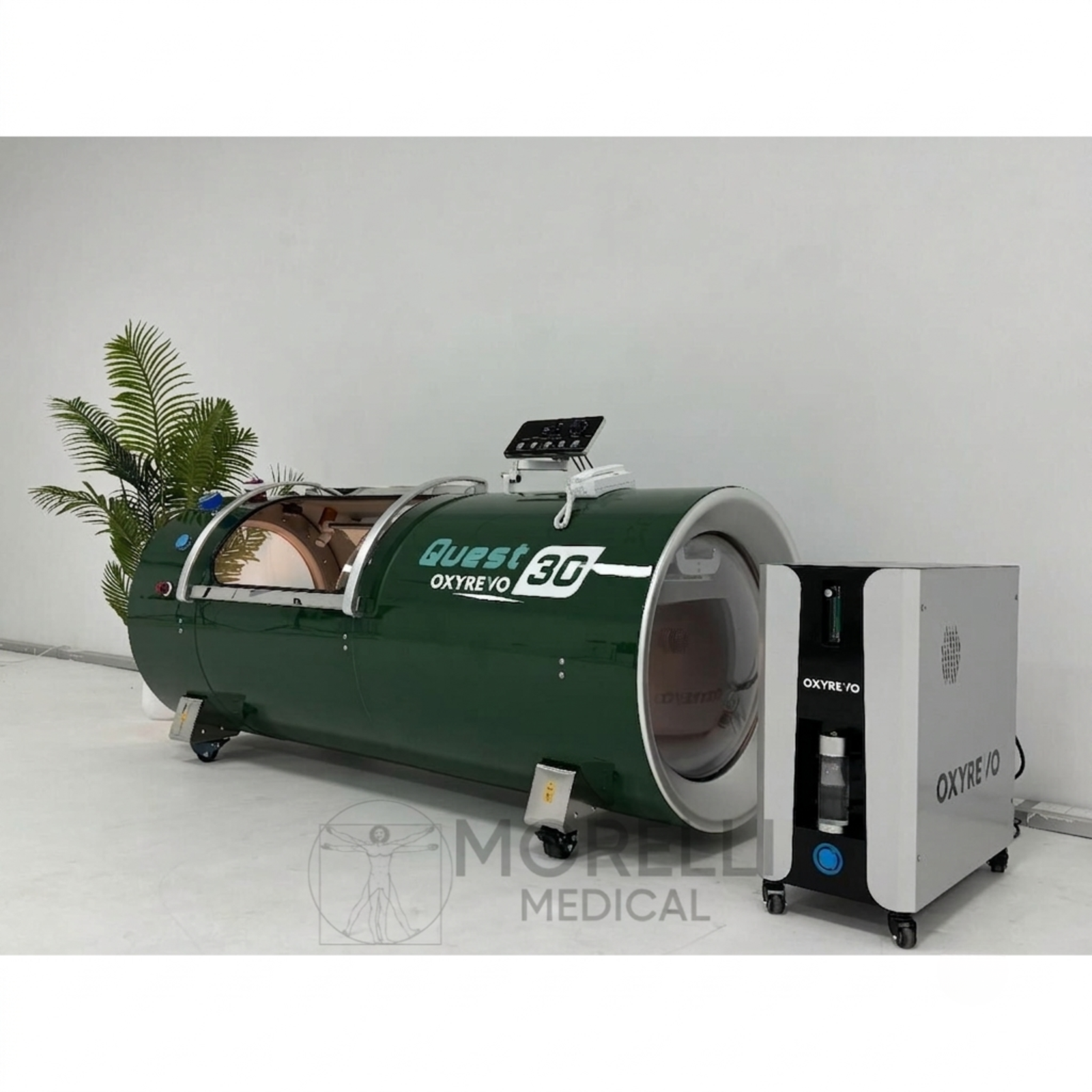 OxyRevo Quest30 Hard-Shell Hyperbaric Chamber – green chamber beside its machine