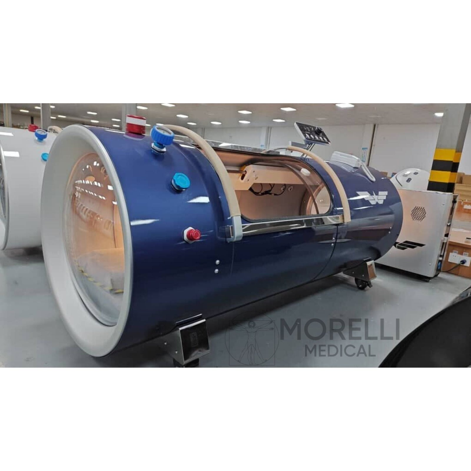 OxyRevo Quest36 Hard-Shell Hyperbaric Chamber – blue chamber in a warehouse