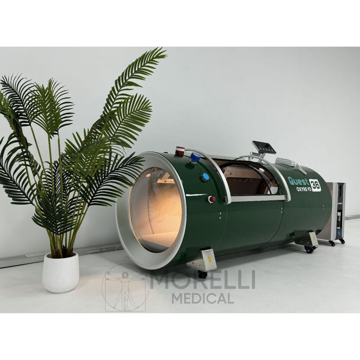 OxyRevo Quest36 Hard-Shell Hyperbaric Chamber – green chamber with a plant