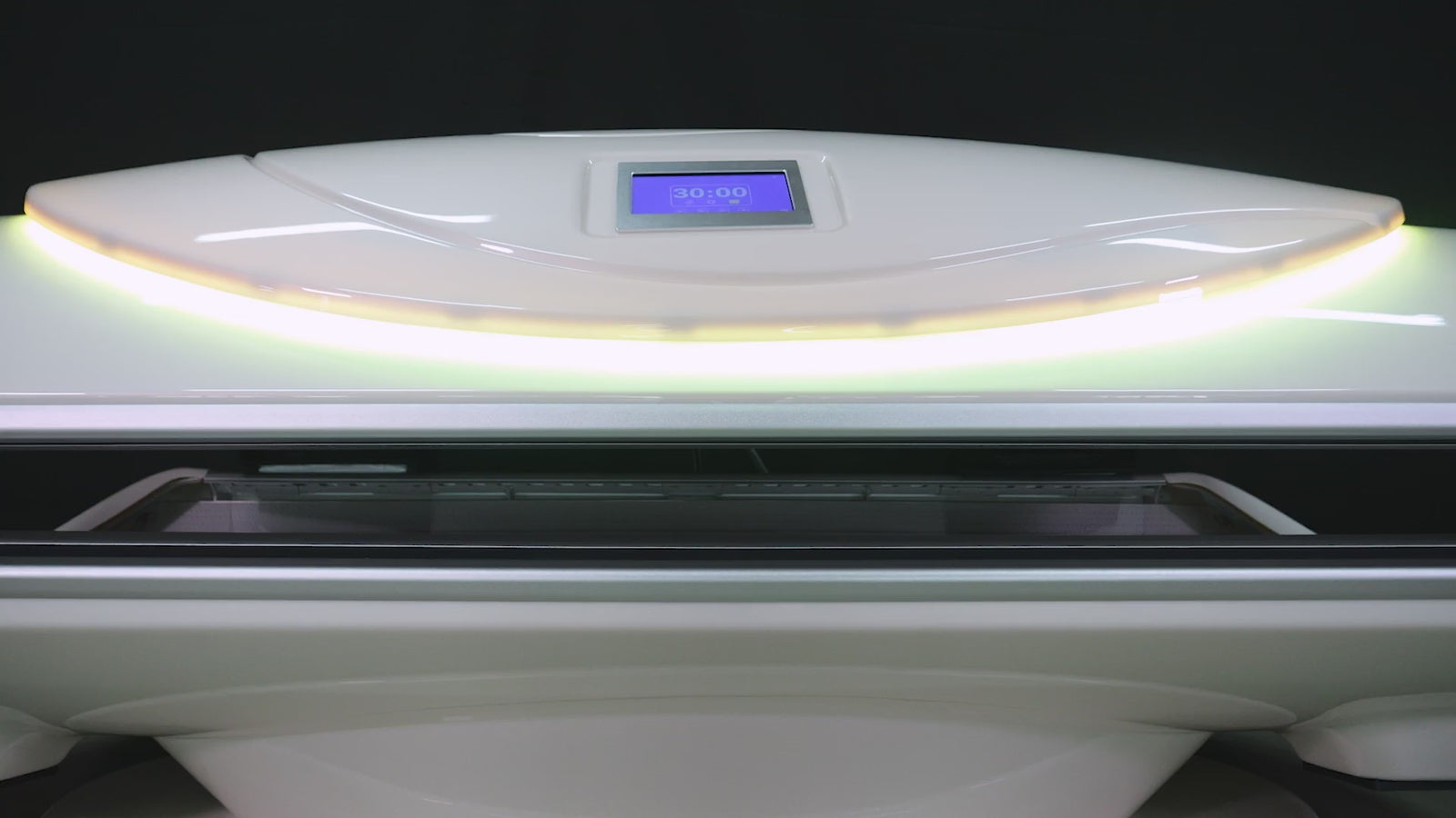 Merican MMB Plus whole-body red light therapy bed in Lunar White, product video showing the contoured cabin, touch display and lamp panels