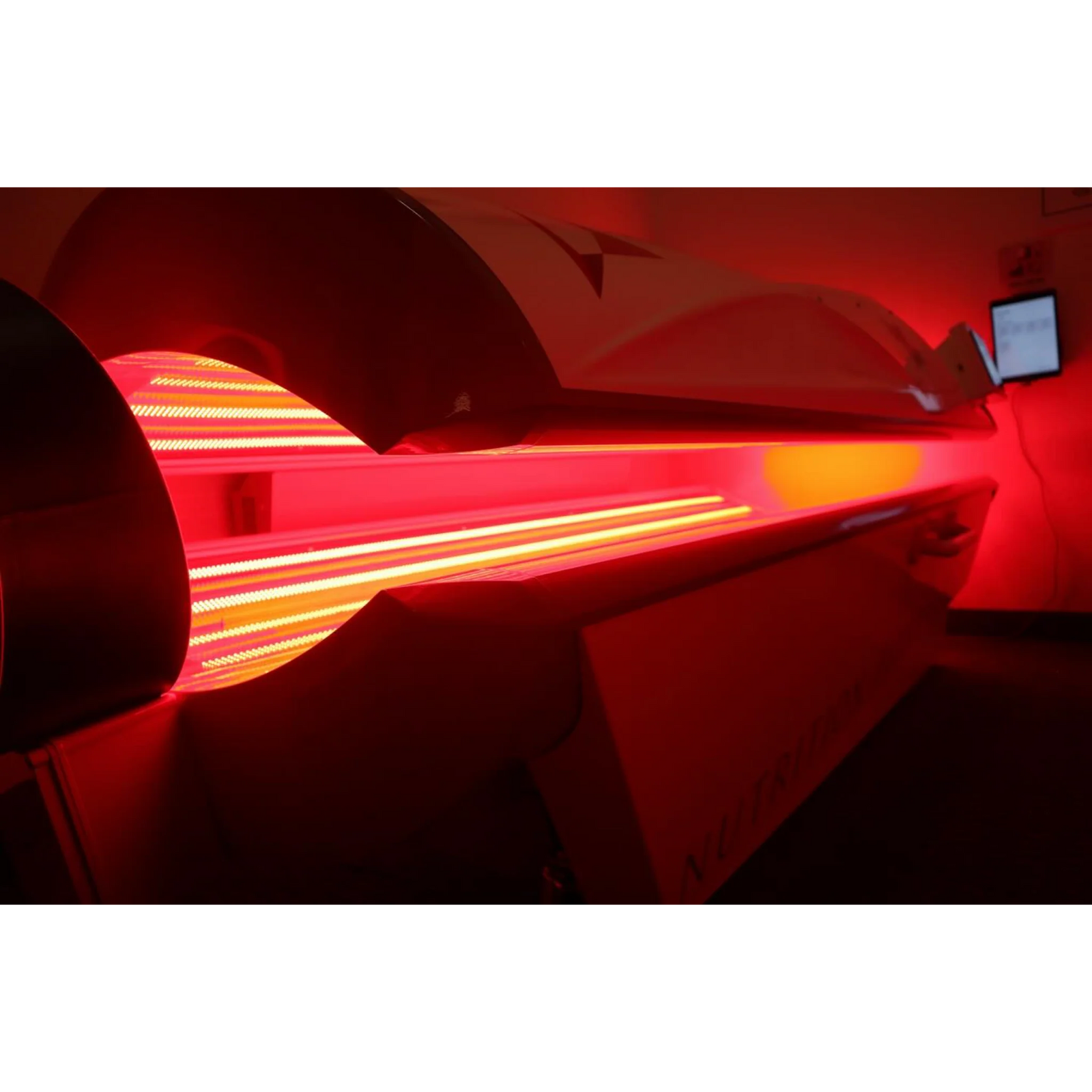Prism Light Pod Full-Body Red Light Therapy Bed – pod interior with glowing red tubes