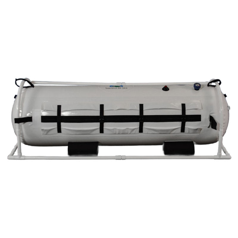 Summit to Sea Shallow Dive 26" Hyperbaric Chamber – side view of the chamber on a white frame